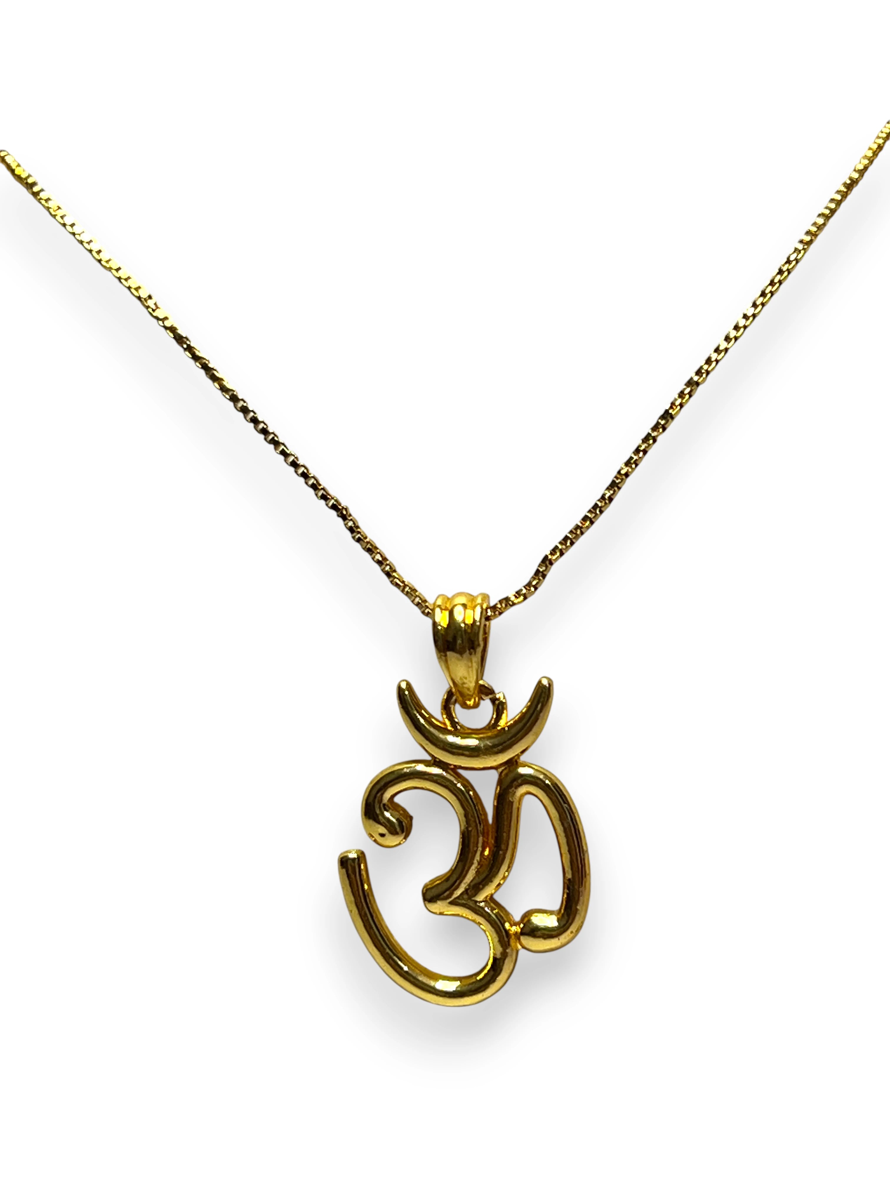 Gold-plated Om pendant with a polished finish, on a clean, light-colored background. Spiritual locket for men and women from Me19.in.