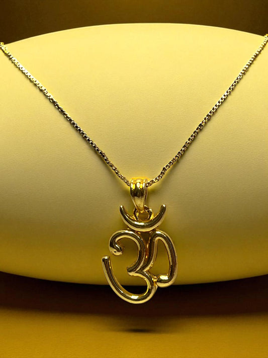 Gold-plated Om pendant with a polished finish, on a clean, light-colored background. Spiritual locket for men and women from Me19.in.